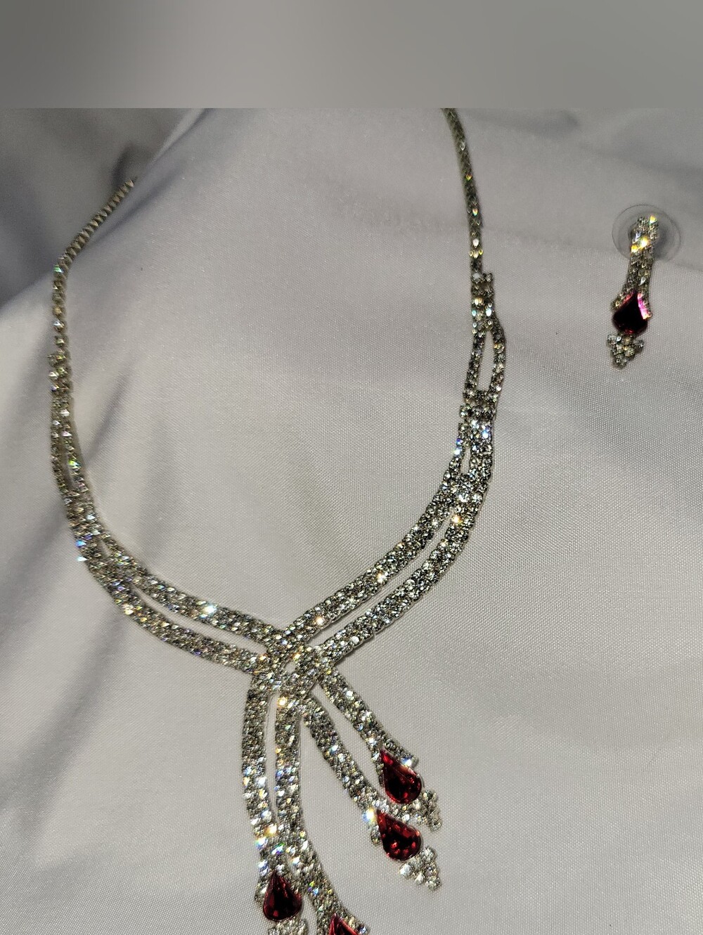 Elegant Silver Crystal Necklace with Red Teardrop Accents